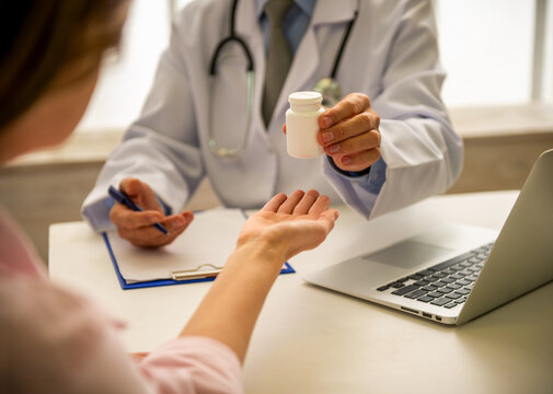 Doctor Giving Medication.