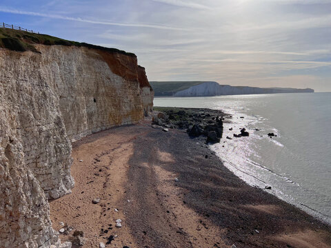 The famous Seven Sisters chalk cliffs, located on the south coast of England in the county of East Sussex, stretching between Seaford and Eastbourne within the South Downs National Park.