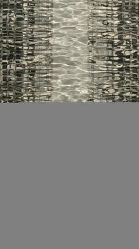 Abstract geometric pattern of refracted lines under rippling water, featuring a smooth liquid surface in ash grey for wallpaper and backgrounds