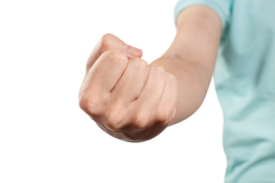 Closed fist extended forward as powerful gesture, isolated on transparent cutout background