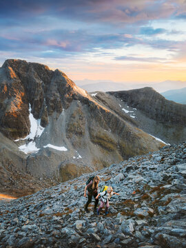Family adventure in Lyngen Alps Norway - mom and child climbing mountain trails outdoor, travel active holidays hiking healthy active lifestyle and nature exploration vacations hobby recreation