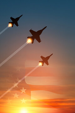 Air Force Day. Aircraft silhouettes on background of sunset with a transparent American flag. Vertical poster.
