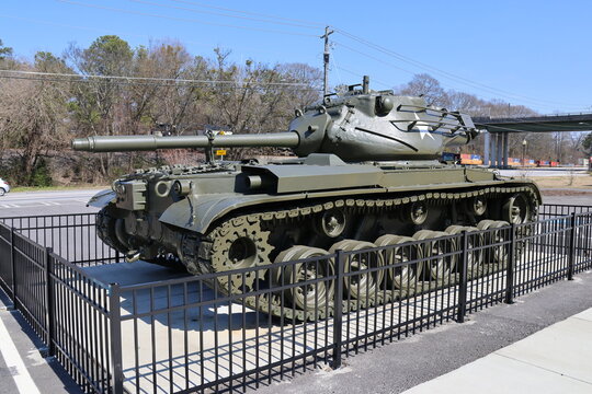 Austell, Georgia - 02 21 2024: City of Austell Veterans Memorial Park. Photo of tank with colorful clouds in the sky. The M47 Patton tank at the Austell Memorial Park