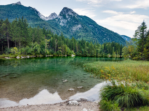 Majestic Alpine Lake Hintersee with Forested Mountains and Clear Water Landscape