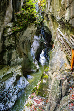 Lammerklamm Gorge in Austria with Mossy Rocks and Wooden Staircase