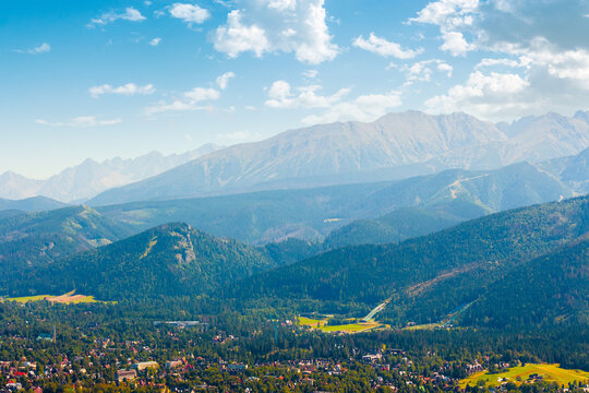 mountain landscape of Poland in late summertime. wonderful view of High Tatra ridge above Zakopane village valley. vacation place in Europe