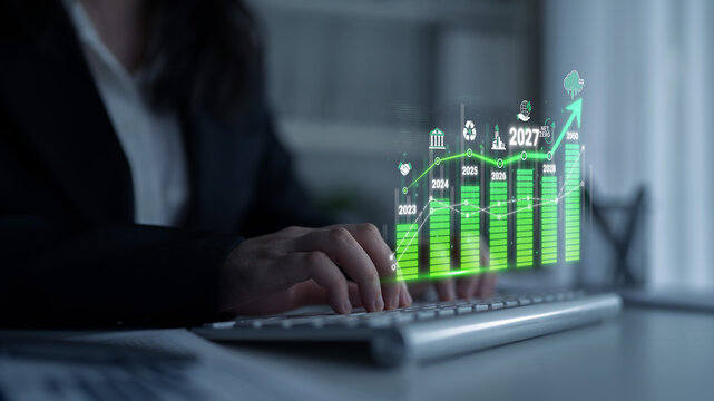 Business Professional Analyzing Data Trends and Growth Projections with Modern Graphical Representation on Keyboard in Office Environment Sigmoid