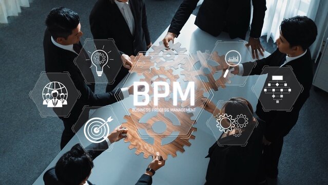 A diverse team collaborates on a business process management project, showcasing gears and icons that signify strategy, efficiency, and innovative thinking in a modern workspace. Raster