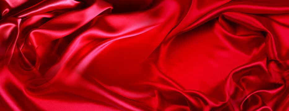 Red silk fabric ripples background