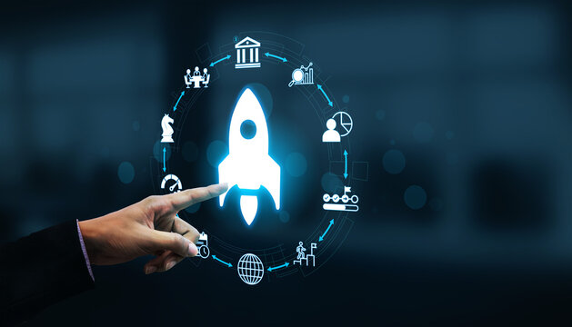 A hand points at a launch icon amid various business and technology symbols, illustrating themes of growth, innovation, and digital transformation in a corporate setting. Nascent