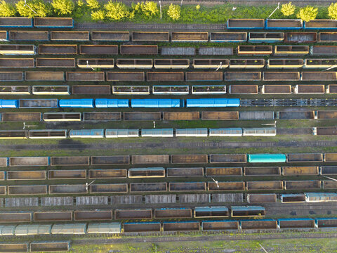 Aerial view of freight rail infrastructure and cargo wagons