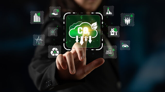 Business Professional Engaging with Digital Green Technology Interface for Carbon Management and Sustainability Solutions Sigmoid