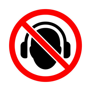 No headphones sign shows black audio device silhouette inside red prohibition circle created for restricted quiet zone compliance noise reduction warning signage.