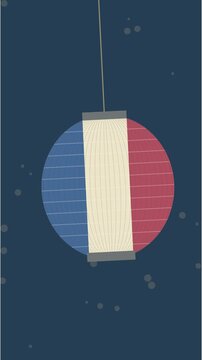 Lanterne en papier bleu, blanc et rouge oscillant au cr&eacute;puscule