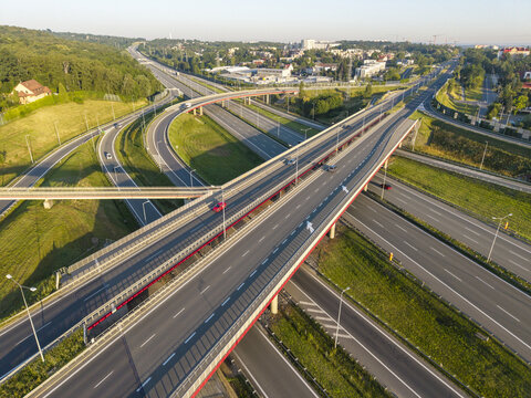 Aerial view of multilayer highway interchange and urban transportation infrastructure