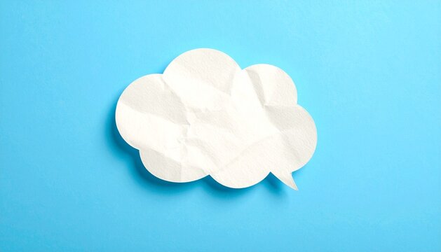 Crumpled Paper Speech Bubble on Blue Background for Message or Idea Concept
