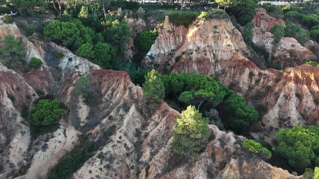 Aerial rocks and cliffs seascape shore view of beach, Algarve. Praia do Barranco das Belharucas