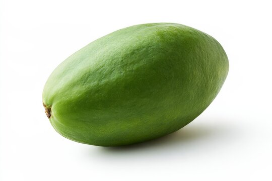 Fresh green papaya isolated on clean white background, premium studio product photography of raw organic healthy exotic fruit