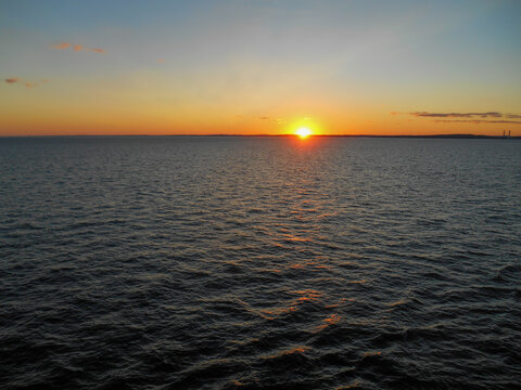 Golden sunset over coastal water