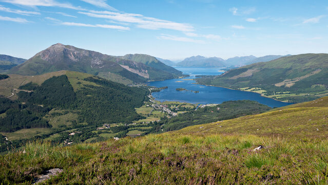 View west from the slopes of the Pap of Glencoe to Loch Leven, Loch Linnhe and the distant  mountains of Ardgour. Glencoe, Lochaber, Scottish Highlands.