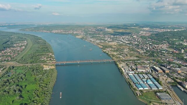 Aerial view of Belgrade with Sava and Danube rivers, historic fortress, urban skyline, bridges, parks, and waterfront landscape Serbia, 4k