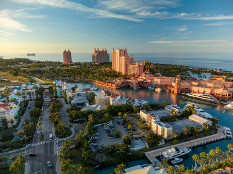 New Providence, The Bahamas - 03 January 2026: Aerial view of the Atlantis Paradise Island resort, featuring iconic pink towers, a marina with luxury yachts, and lush tropical surroundings.