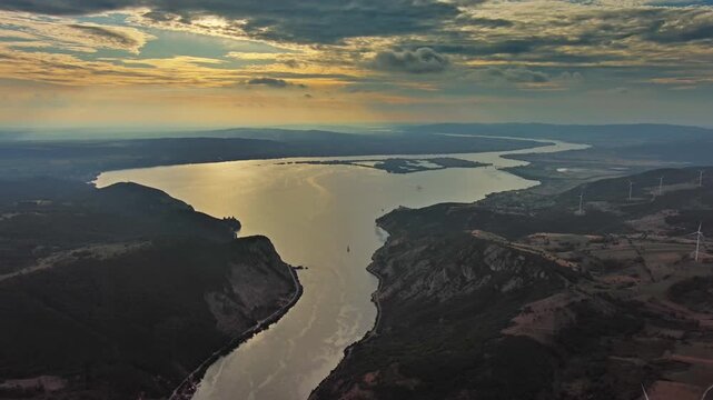 Aerial view on the Danube river and mountains in Djerdap Park at sunset, Serbia Romania border, 4k