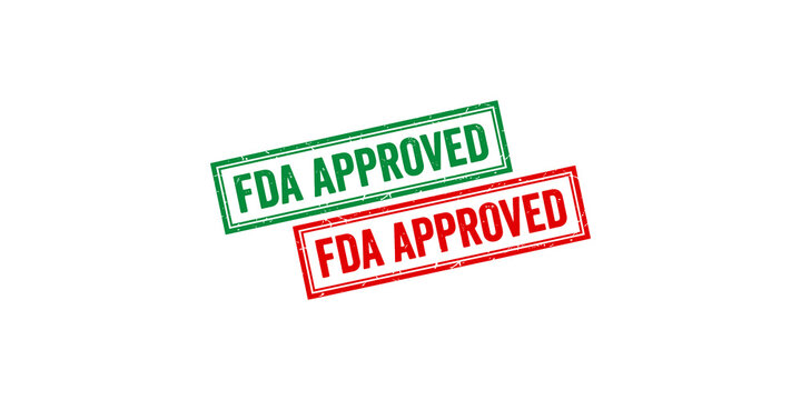 Fda approved rubber stamps in red and green colors for official document validation.
