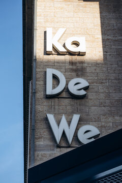 Berlin, Germany - April 23, 2026: Facade detail of the KaDeWe department store with its distinctive vertical signage on Tauentzienstrasse.