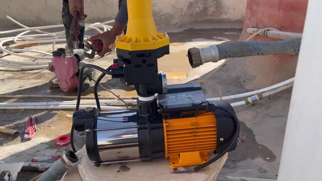 New Water Booster Pump with Pressure Controller Installed on Rooftop