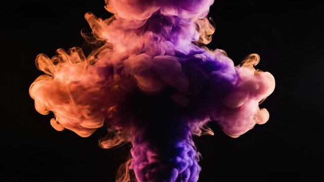 Colorful ink smoke clouds swirling in water on black background. Bright vibrant color diffusion explosion for creative design, texture, pattern and wallpaper backgrounds