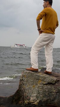 man standing on the beach