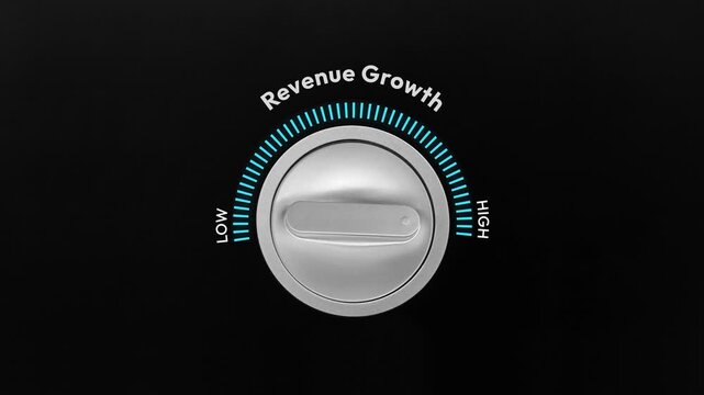Business revenue growth concept with dial knob turning from low to high progress with black isolated backdrop