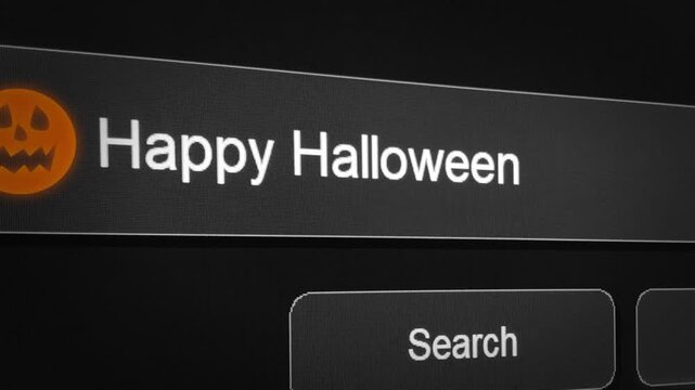 Close up 4k footage of computer screen typing Happy Halloween text with pumpkin in search