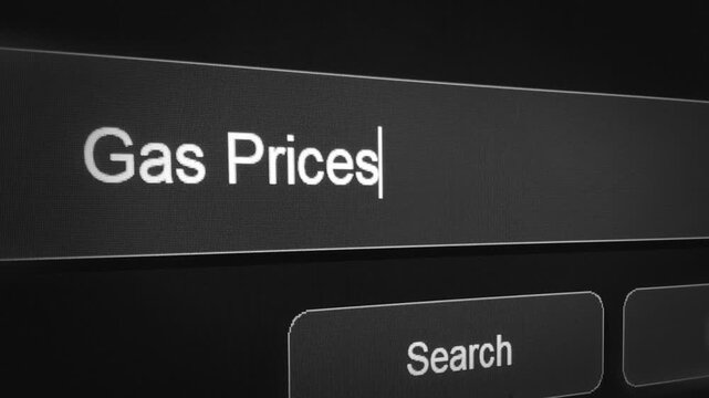 Close up of black search bar typing gas prices with search button highlighted 4k footage