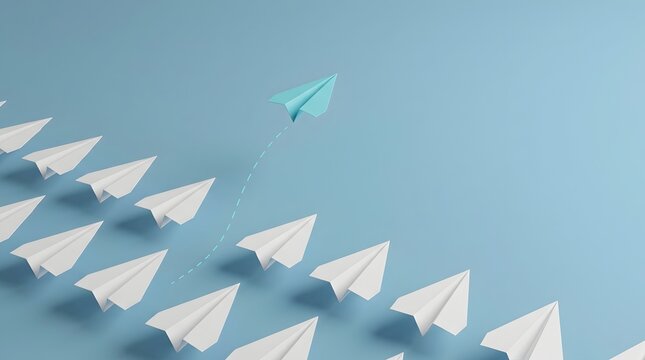 One blue paper airplane flying in a different direction from a line of white paper airplanes symbolizing individuality and innovation