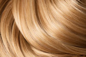 Blond hair curls background, lock of hair, healthy and beauty dyed hair backdrop design, salon, treatment, cure, dying concept. Close up, top view.  © Subbotina Anna
