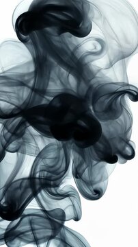 Ink Cloud Transformation: A mesmerizing abstract image depicts dark ink swirling and dispersing in clear liquid, creating ethereal, smoke-like forms and a sense of dynamic movement and transformation.
