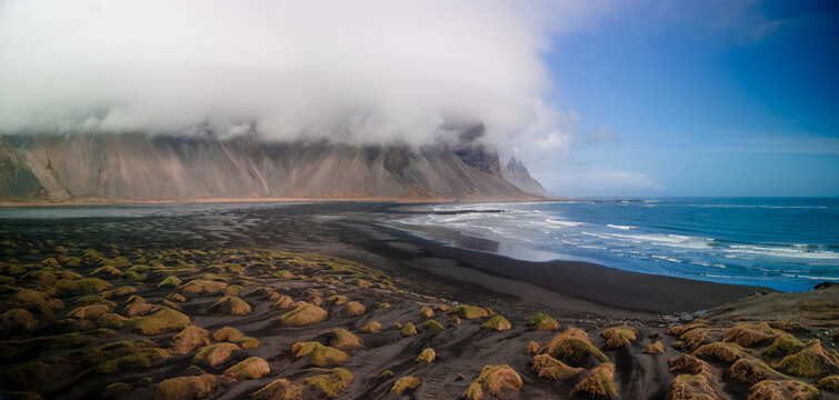 Vestrahorn mountain overlooking black sand beach and Atlantic Ocean