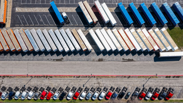 Aerial view of semi trucks and trailers parking lot