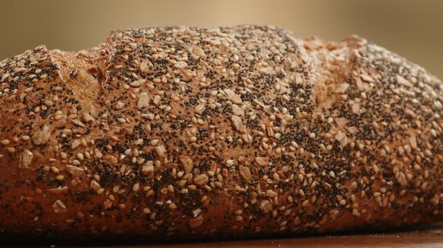 Bread table, healthy Rustic Spanish table with assorted European bread, whole grain loaf, seeded bread and small baguette