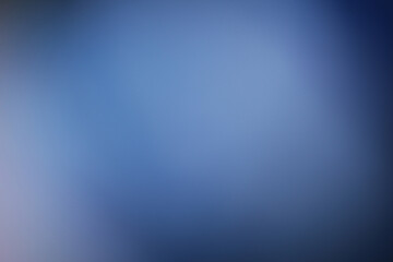 Obraz premium Abstract dark blue gradient background with soft light and copy space