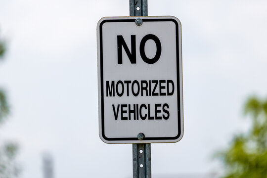 No Motorized Vehicles Road Sign on metal post