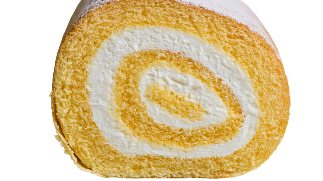 Isolated delicious freshly baked Swiss roll cake slice, fluffy sponge with sweet cream filling