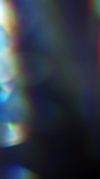 Light reflect burst illuminating the brilliance of a reflective prism. Radiant lighting creating a visual effect of light refraction in a rainbow colors and a dreamy rays of lights background. Loop