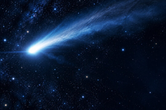 Interstellar comet with glowing coma and long tail in star field, astronomy and space concept