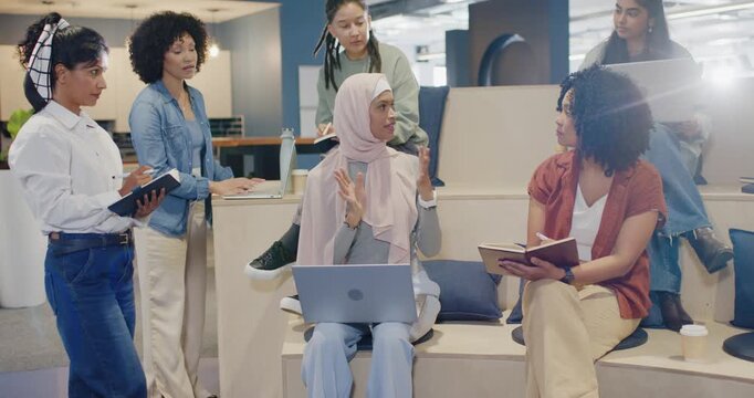 Diverse team after bottle offer, Asian woman in pink hijab showing laptop planning test at office