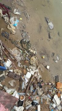 Top Down View of Plastic Garbage and Waste on Shoreline