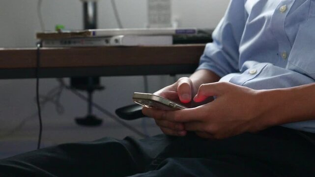 Students who can&rsquo;t concentrate on studying at home and play with their smartphones, students who use their smartphones while studying&mdash;beware of dopamine addiction. Vertical video featuring a close-up 
