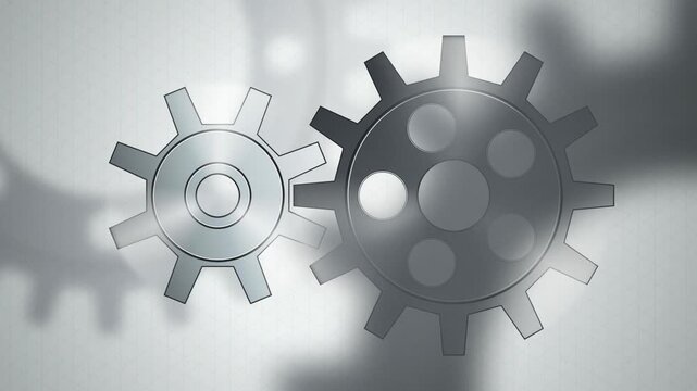 Metallic cogwheels turning together seamless loop